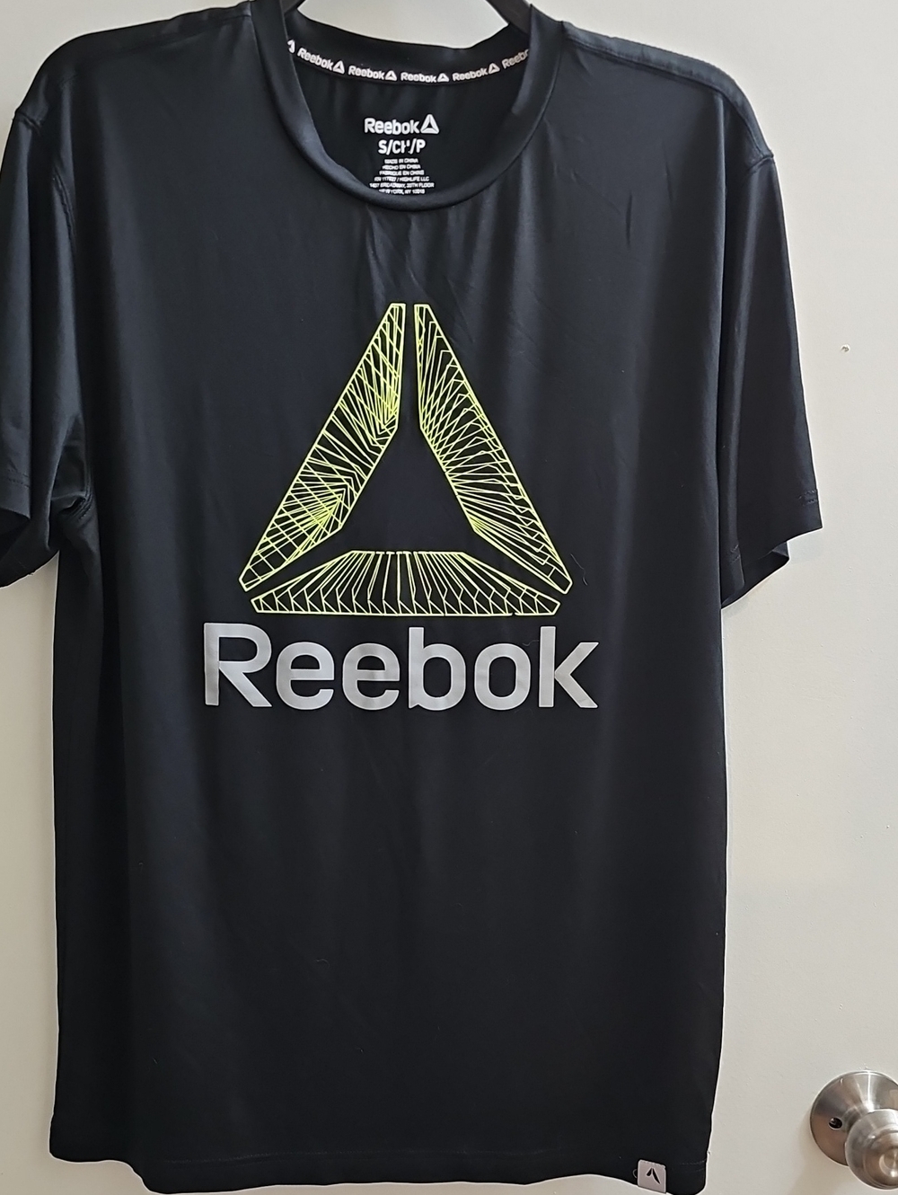 Reebok Men’s Black Tee with Neon Yellow Logo